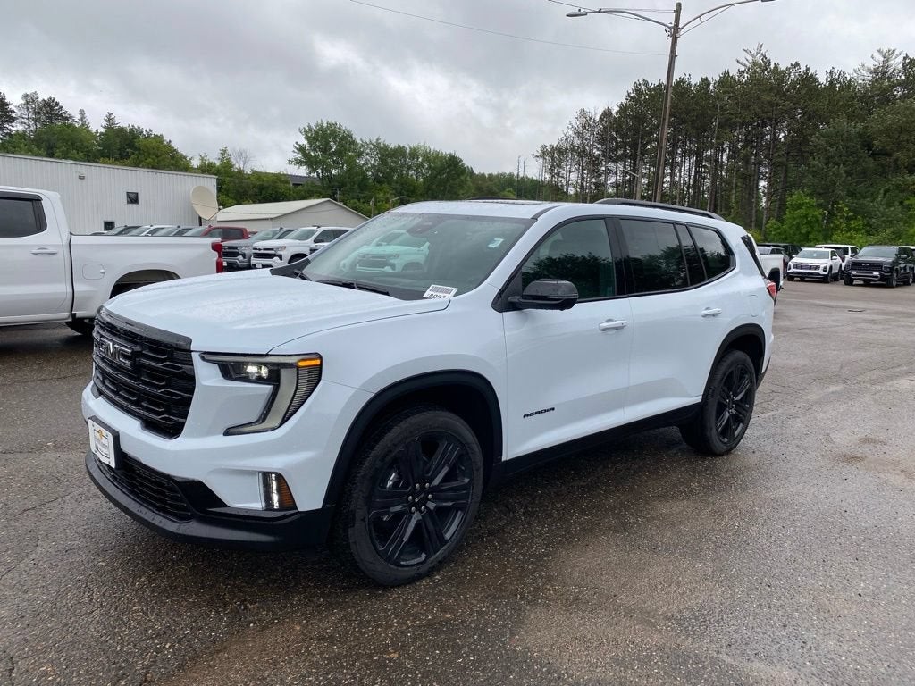 2026 GMC Acadia Elevation in Glacier White Tricoat — front three-quarter view