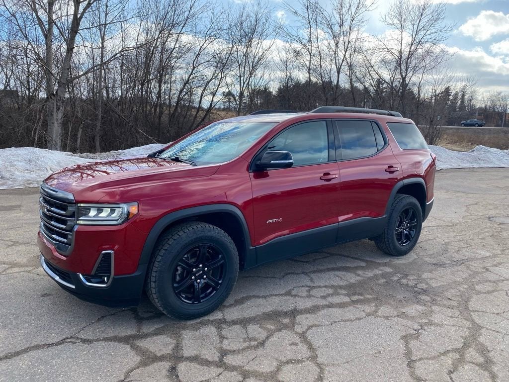 2021 GMC Acadia AT4 in Cayenne Red Tintcoat — front three-quarter view