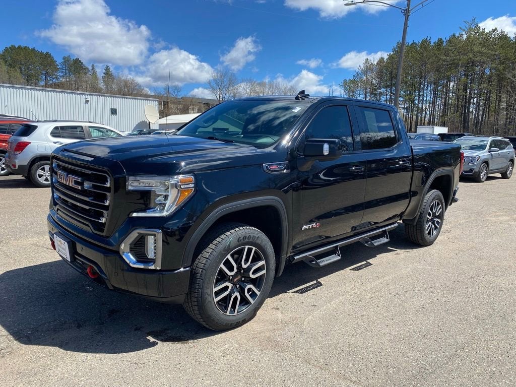2021 GMC Sierra 1500 AT4 in Onyx Black — front three-quarter view