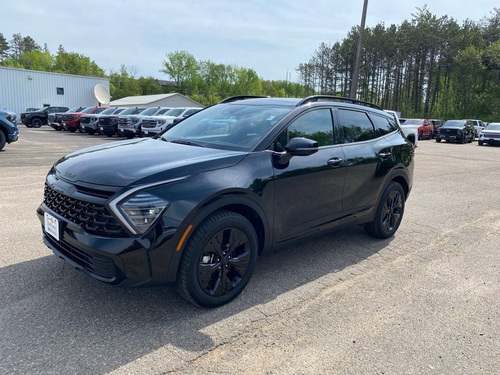 2025 Kia Sportage X-Line in Black — front three-quarter view