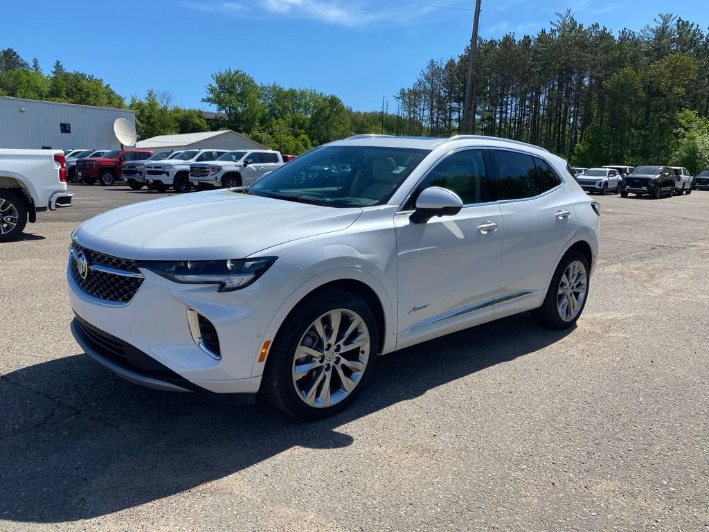 2023 Buick Envision Avenir in White Frost Tricoat — front three-quarter view